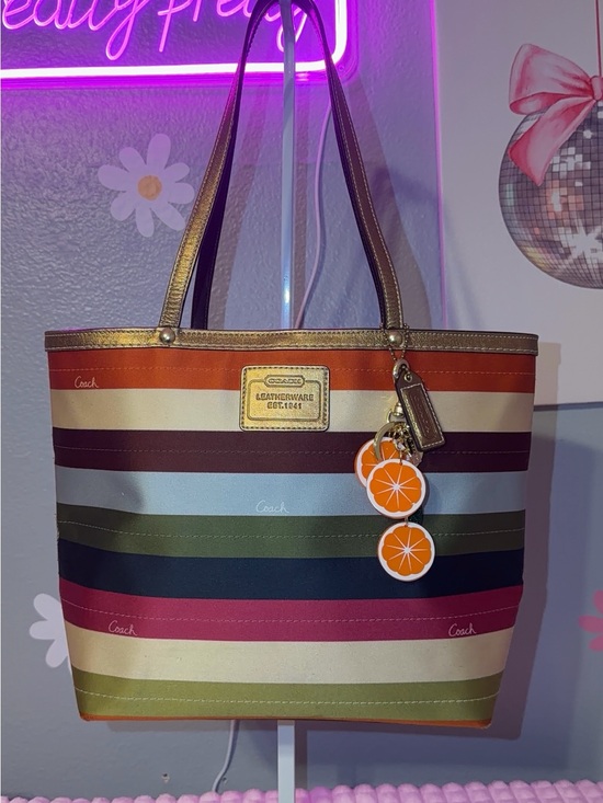 Coach Handbags - Coach Multicolor Striped Tote with Orange Charm and Gold Trim